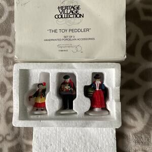 Department 56 the toy peddler, three-piece porcelain set
